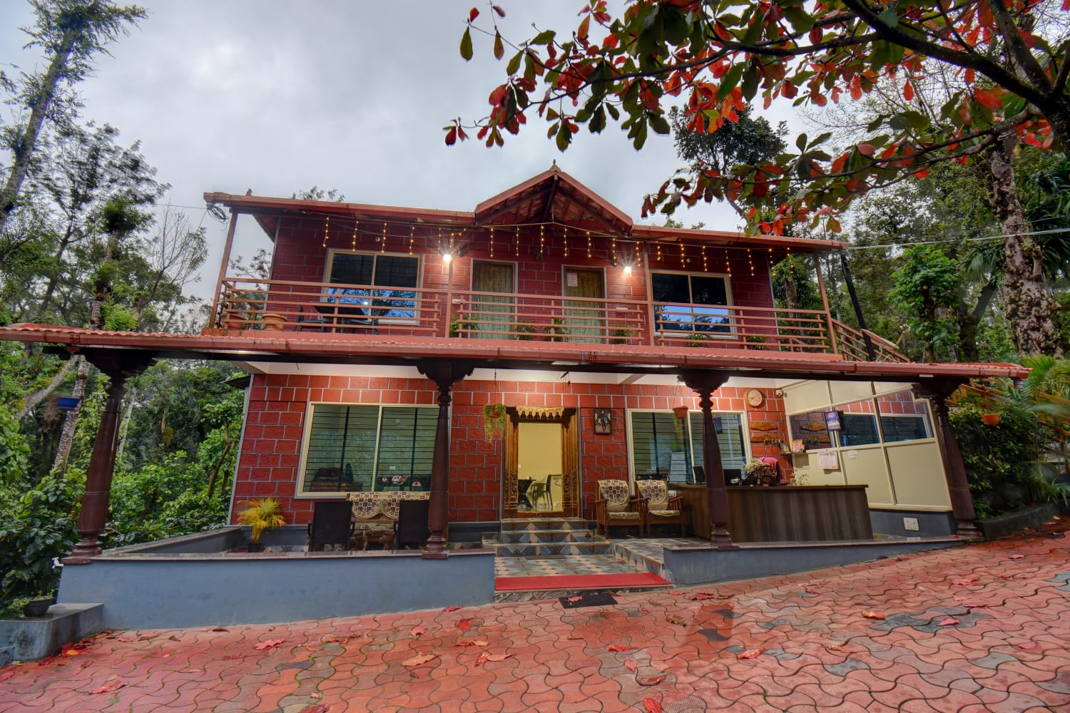 Two-story red-brick cottage and main reception area
